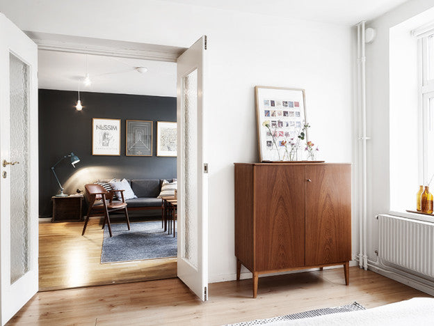 Scandinavian home in dark shades