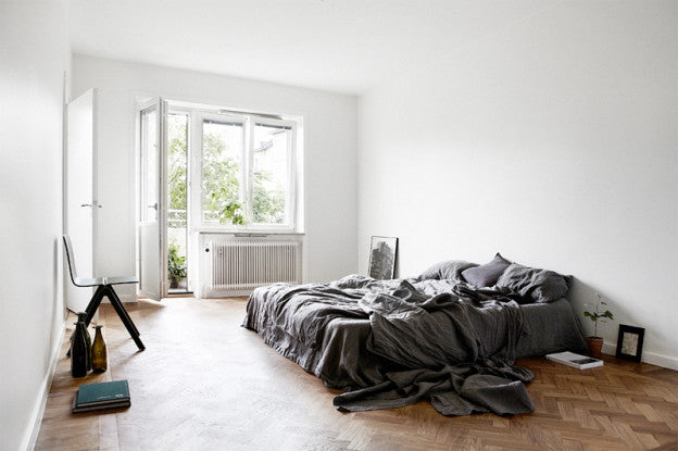 Minimalist bedroom in grey